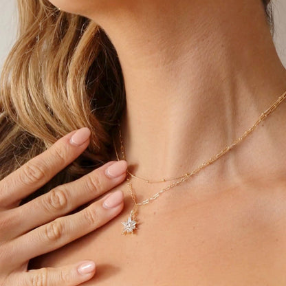 Model wearing the LucyKitty Gold Filled Saturna Chain and Flykra Necklace